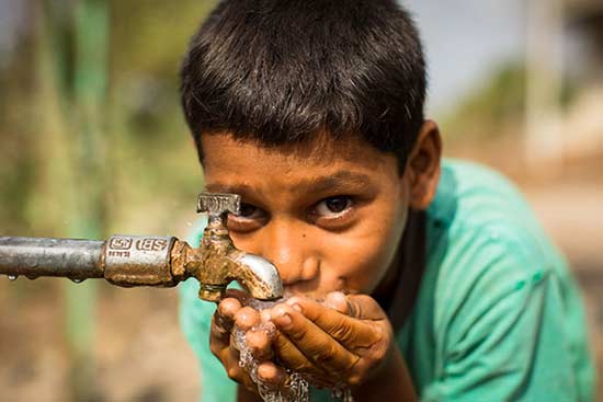 Boy Drinking Clean Water