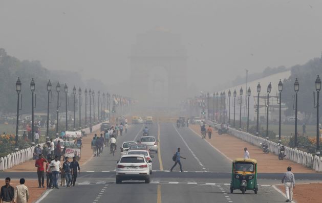 Smog Covers Delhi While Mumbai Drowns in Rain